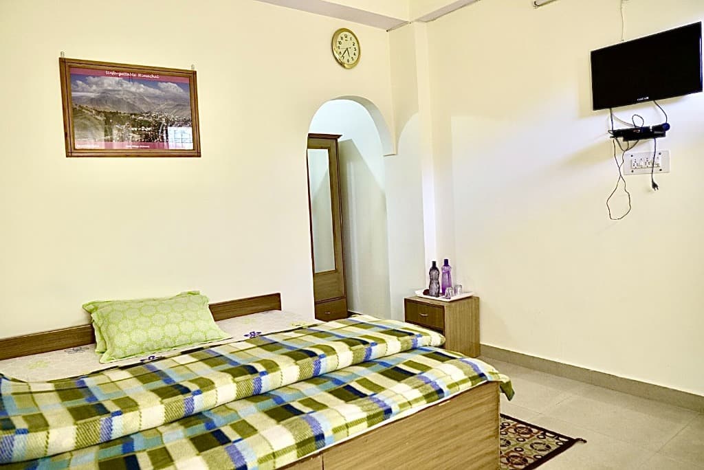 Cozy Double Bed & In-Room Amenities