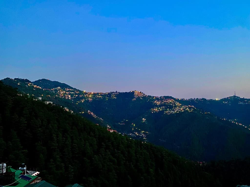 Twinkling Night Lights & Deep Valleys